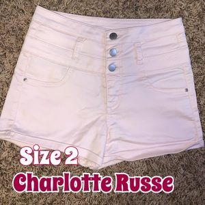 Light pink high waisted stretchy jean shorts